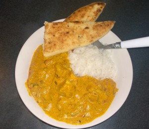 Chicken Curry served with basmati rice and naan bread.